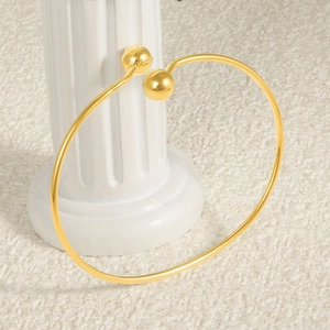 Minimalist 18k gold plated stainless steel open cuff bracelet with ball terminals design
