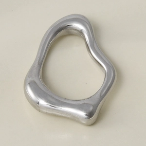 Macro view of high-polished 304 stainless steel irregular organic oval pendant