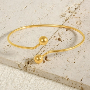 Minimalist 18k gold plated stainless steel open bangle with polished bead ends