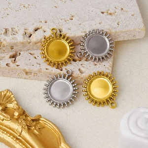 Macro shot of 304 stainless steel sun charms in gold and silver for DIY jewelry making