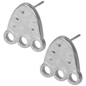 Detail of silver stainless steel earrings featuring hammered texture and three hanging rings