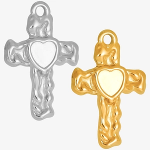 Macro detail of 304 stainless steel heart cross charms with textured lava finish