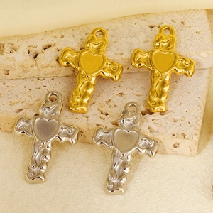 Detailed view of lava texture 304 stainless steel heart cross pendants in gold and silver