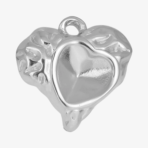Macro detail of silver heart pendant with irregular lava texture and smooth center