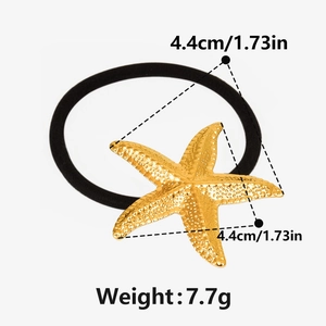 Détail de l'élastique étoile de mer en or 18 carats avec dimensions 4,4cm et poids 7,7g