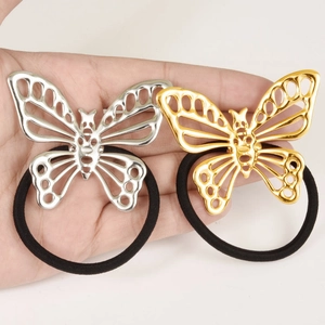 Élastiques à cheveux papillon en acier inoxydable 304 or et argent sur fond blanc pur