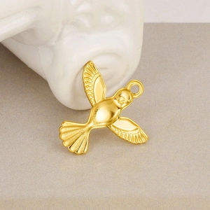 304 stainless steel bird pendant with matte gold finish and detailed feather patterns
