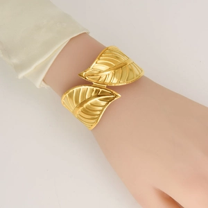 Adjustable 18K gold plated leaf-shaped open cuff bracelet with intricate vein texture