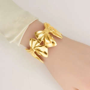 Bracelet manchette chic en acier inoxydable 304 plaqué or 18K avec design à nœuds empilés