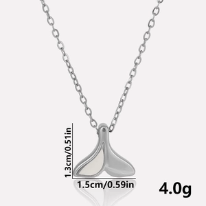 Detail view of fishtail necklace showing 1.3cm height and 1.5cm width dimensions