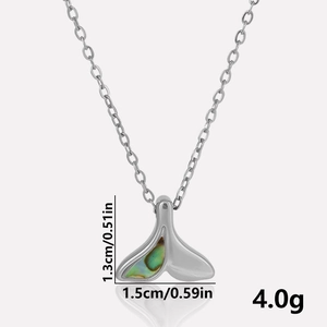Detailed view of fishtail necklace pendant with shell inlay showing 1.5cm width and 4g weight
