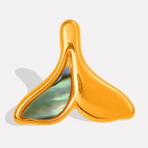 Detailed macro view of a 304 stainless steel fishtail pendant with iridescent abalone shell