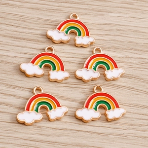 Close-up of rainbow cloud charms with colorful enamel finish for DIY jewelry making