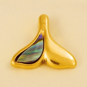 Detailed macro view of a golden 304 stainless steel whale tail pendant with abalone shell