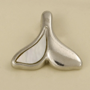Close-up of a 304 stainless steel fishtail pendant featuring white mother-of-pearl inlay