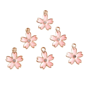 Pink cherry blossom charms with gold metal base and small crystal center for DIY jewelry