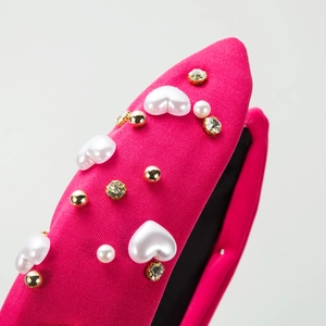 Rose pink baroque headband featuring heart pearls, rhinestones and luxury knot texture