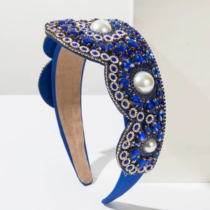 Macro shot of royal blue baroque headband with deep blue crystals and white pearls