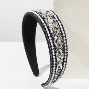 Detailed macro view of vintage baroque wide headband with pearls and rhinestones