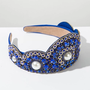 Detail of baroque headband with blue crystals, white pearls, and gold rhinestone trim