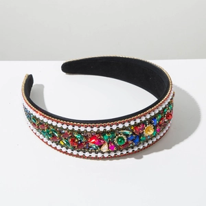 Detailed view of luxury Baroque wide headband with colorful crystals and white pearls
