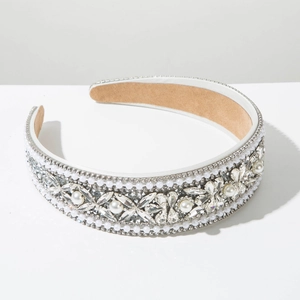 Detail of baroque pearl headband showing intricate rhinestone patterns and velvet lining