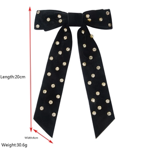 Détails d'une pince à cheveux nœud en velours de 20cm avec strass et dimensions