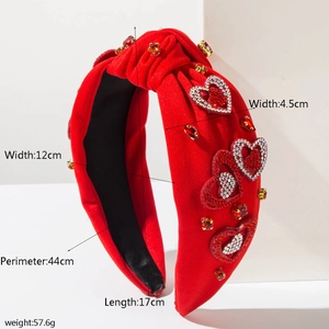 Specifiche dettagliate del cerchietto rosso annodato con decorazioni a cuore di strass