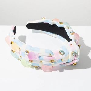Detail of macaron plaid headband featuring translucent rabbits and gold beads