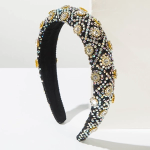 Détails de strass AB colorés et accents floraux dorés sur un serre-tête luxe en velours