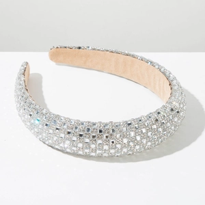 Macro shot of the luxury baroque headband showing silver rhinestones and soft velvet lining