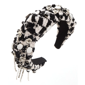 Detail of houndstooth headband with hand-sewn rhinestones, pearls and sparkling tassels