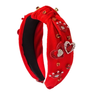 Cerchietto annodato in velluto rosso con corona e decorazioni a cuore in strass
