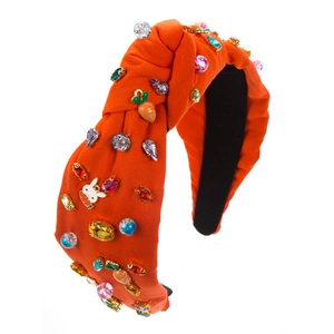 Vue détaillée du serre-tête orange avec cristaux scintillants et pendentifs lapins