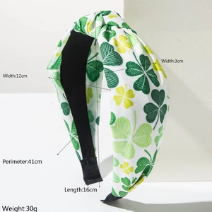 St. Patrick's Day wide headband with green shamrock prints and product dimensions