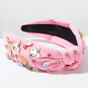 Detailed side view of pink Easter headband with rabbit charms and colorful rhinestones