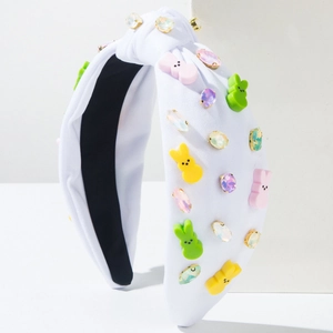 Easter knotted headband with colorful rhinestones and cute bunny carrot accents on white fabric