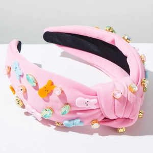 Serre-tête noué rose orné de strass colorés et de détails de lapins en acrylique