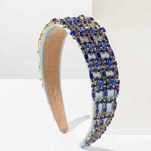 Baroque style wide headband featuring dark blue crystals and rhinestones on light blue satin