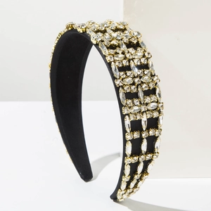 Detailed view of luxury baroque headband featuring full crystal rhinestones and gold claws
