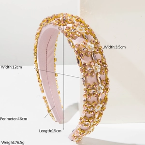 Pink rhinestone flower headband with padded satin design and luxury crystal embellishment