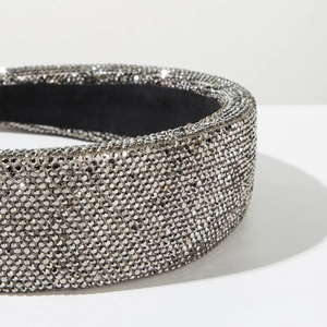 Macro shot of luxury wide headband featuring full silver grey rhinestone micro-pave surface