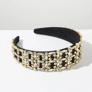 Detailed view of Baroque headband with sparkling crystals on vintage gold frame