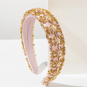 Pink rhinestone padded headband with crystal flowers and gold settings for parties