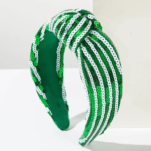 Green and white sequined St. Patrick's Day knotted headband for festive celebrations