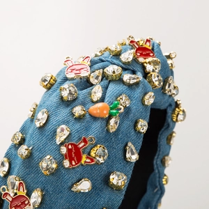 Detailed macro view of rhinestone embellishments on denim fabric Easter headband