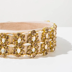 Detail of baroque headband with champagne crystals and gold metal claw settings