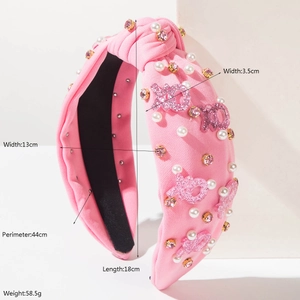 Serre-tête noué rose avec perles blanches, strass roses et écussons à lettres XOXO