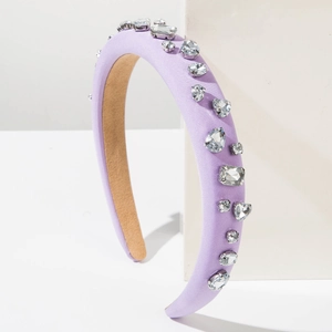 Detail of lavender padded headband featuring multi-shape crystal rhinestones on fabric