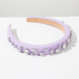 Detail of lavender purple padded satin headband with sparkling crystal rhinestones inlay